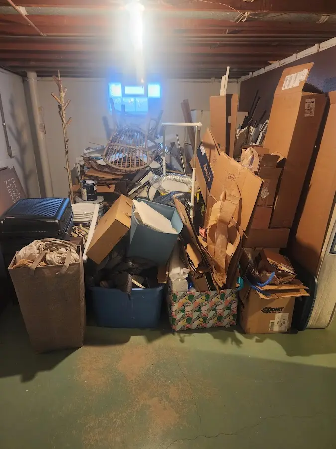 Roll-off dumpster container at job site for 2 Yard Dumpster Rental in Pontiac